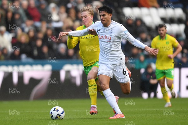 251025 - Swansea City v Norwich City - Sky Bet Championship - Marko Stamenic of Swansea City is challenged by Pelle Mattsson of Norwich