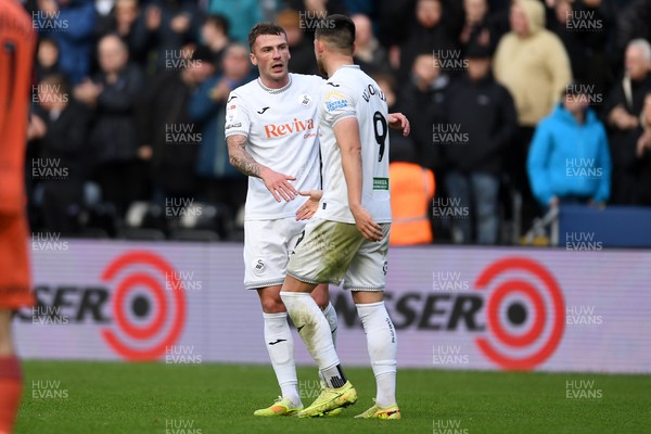 251025 - Swansea City v Norwich City - Sky Bet Championship - Zan Vipotnik of Swansea City celebrates scoring a goal with team mates