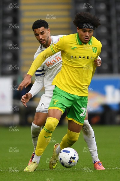 251025 - Swansea City v Norwich City - Sky Bet Championship - Ben Cabango of Swansea City is challenged by Jovon Makama of Norwich