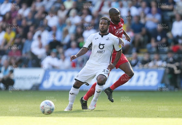 140919 - Swansea City v Nottingham Forest, SkyBet Championship - Wayne Routledge of Swansea City plays the ball forward