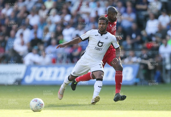 140919 - Swansea City v Nottingham Forest, SkyBet Championship - Wayne Routledge of Swansea City plays the ball forward