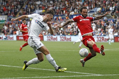 150918- Swansea City v Nottingham Forest, EFL Championship - Danny Fox of Nottingham Forest (right) blocks a shot from Matt Grimes of Swansea City