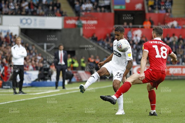 150918- Swansea City v Nottingham Forest, EFL Championship - Kyle Naughton of Swansea City (left) in action with  Jack Robinson of Nottingham Forest