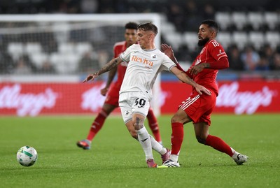 170925 - Swansea City v Nottingham Forest - Carabao Cup - Ethan Galbraith of Swansea City is challenged by Douglas Luiz of Nottingham Forest