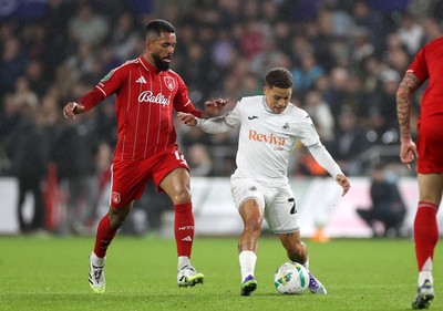 170925 - Swansea City v Nottingham Forest - Carabao Cup - Manuel Benson of Swansea City is challenged by Douglas Luiz of Nottingham Forest
