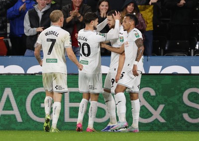 170925 - Swansea City v Nottingham Forest - Carabao Cup - Zan Vipotnik of Swansea City celebrates scoring a goal with team mates