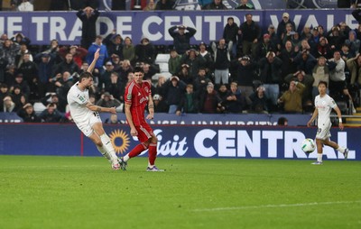 170925 - Swansea City v Nottingham Forest - Carabao Cup - Cameron Burgess of Swansea City scores the game winning goal