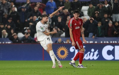 170925 - Swansea City v Nottingham Forest - Carabao Cup - Cameron Burgess of Swansea City scores the game winning goal