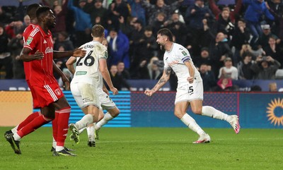 170925 - Swansea City v Nottingham Forest - Carabao Cup - Cameron Burgess of Swansea City celebrates scoring the game winning goal