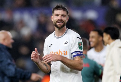 170925 - Swansea City v Nottingham Forest - Carabao Cup - Cameron Burgess of Swansea City at full time