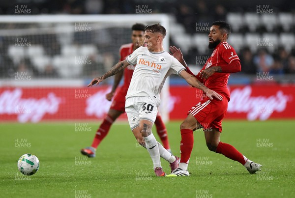 170925 - Swansea City v Nottingham Forest - Carabao Cup - Ethan Galbraith of Swansea City is challenged by Douglas Luiz of Nottingham Forest
