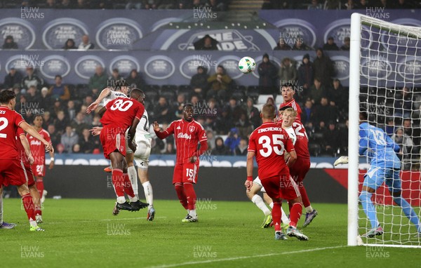 170925 - Swansea City v Nottingham Forest - Carabao Cup - Cameron Burgess of Swansea City headers the ball to score a goal