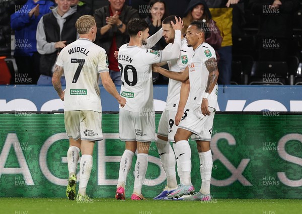 170925 - Swansea City v Nottingham Forest - Carabao Cup - Zan Vipotnik of Swansea City celebrates scoring a goal with team mates