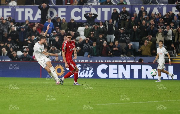170925 - Swansea City v Nottingham Forest - Carabao Cup - Cameron Burgess of Swansea City scores the game winning goal