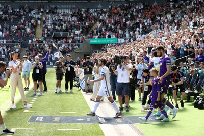 030525 - Swansea City v Oxford United - SkyBet Championship - Joe Allen of Swansea City walks out onto the pitch for his final game