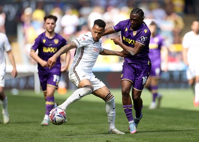 030525 - Swansea City v Oxford United - SkyBet Championship - Ronald of Swansea City is challenged by Alex Matos of Oxford United 