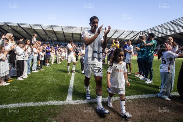 030525 - Swansea City v Oxford United - SkyBet Championship - Kyle Naughton of Swansea City thanks his team mates and supporters on his final game of his career
