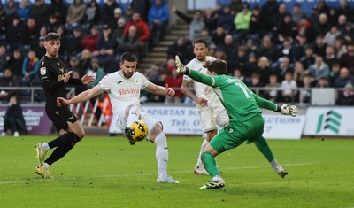061225 - Swansea City v Oxford United, EFL Sky Bet Championship - Zan Vipotnik of Swansea City beats Oxford United goalkeeper Jamie Cumming but the goal is ruled out for offside