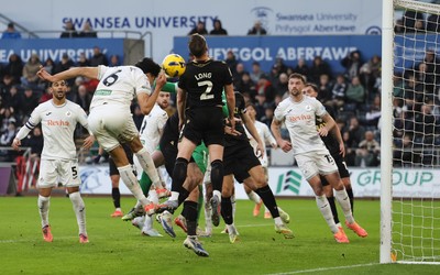 061225 - Swansea City v Oxford United, EFL Sky Bet Championship - Marko Stamenic of Swansea City heads to score the opening goal