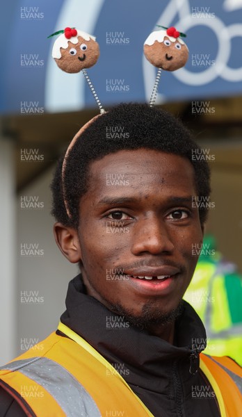 061225 - Swansea City v Oxford United, EFL Sky Bet Championship - Match stewards in the East stand get into the Christmas spirit with festive headwear