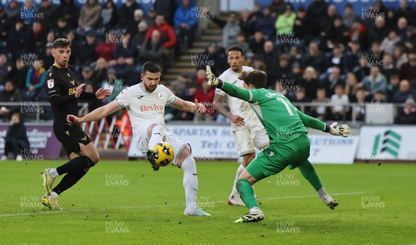 061225 - Swansea City v Oxford United, EFL Sky Bet Championship - Zan Vipotnik of Swansea City beats Oxford United goalkeeper Jamie Cumming but the goal is ruled out for offside