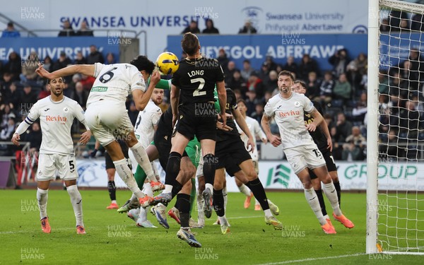 061225 - Swansea City v Oxford United, EFL Sky Bet Championship - Marko Stamenic of Swansea City heads to score the opening goal