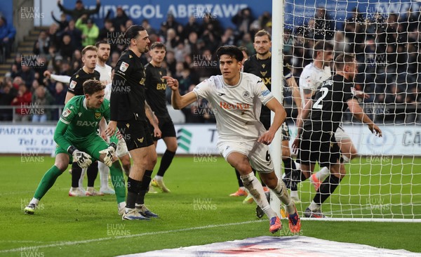 061225 - Swansea City v Oxford United, EFL Sky Bet Championship - Marko Stamenic of Swansea City celebrates after he heads to score the opening goal