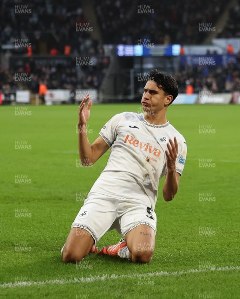 061225 - Swansea City v Oxford United, EFL Sky Bet Championship - Marko Stamenic of Swansea City celebrates after he heads to score the opening goal