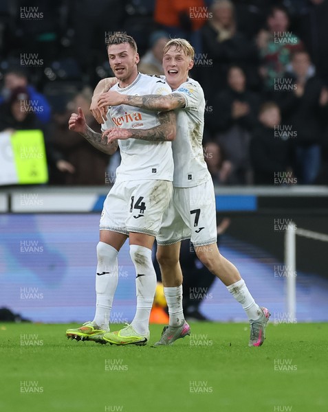 061225 - Swansea City v Oxford United, EFL Sky Bet Championship - Josh Tymon of Swansea City is congratulated by Josh Key of Swansea City after scoring the second goal