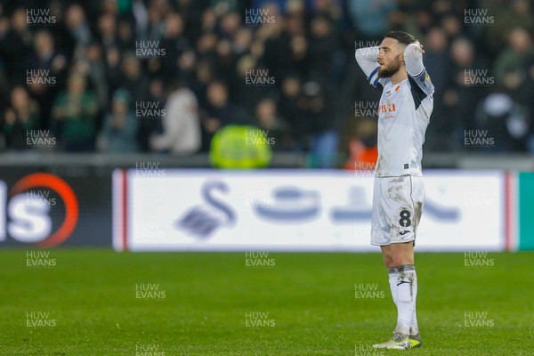 030224 - Swansea City v Plymouth Argyle - Sky Bet Championship - Matt Grimes of Swansea City look dejected at end of game