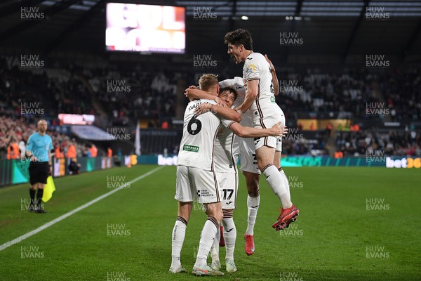 090425 - Swansea City v Plymouth Argyle - Sky Bet Championship - Harry Darling of Swansea City celebrates scoring a goal with team mates