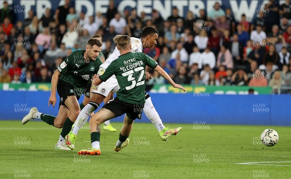 240821 - Swansea City v Plymouth Argyle - Carabao Cup - Morgan Whittaker of Swansea City scores his third goal of the game
