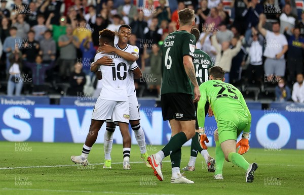 240821 - Swansea City v Plymouth Argyle - Carabao Cup - Morgan Whittaker of Swansea City celebrates scoring his third goal with Jamal Lowe