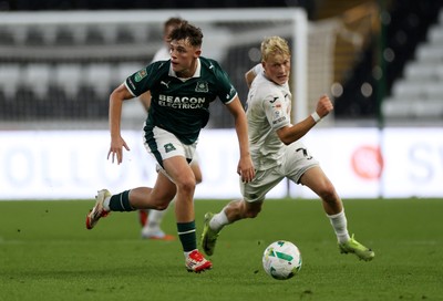 260825 - Swansea City v Plymouth Argyle - Carabao Cup - Tegan Finn of Plymouth Argyle is challenged by Melker Widell of Swansea City 