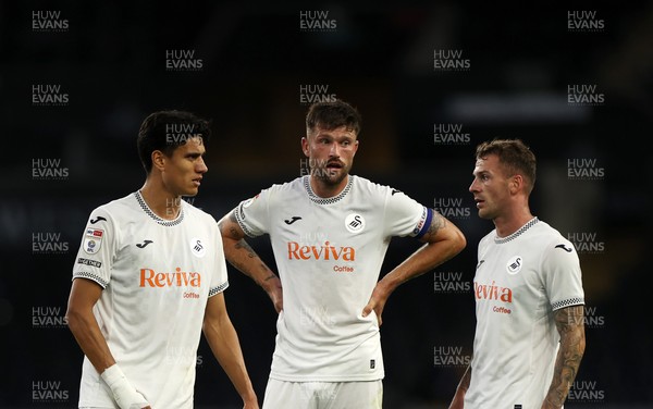 260825 - Swansea City v Plymouth Argyle - Carabao Cup - Marko Stamenic, Cameron Burgess and Josh Tymon of Swansea City 