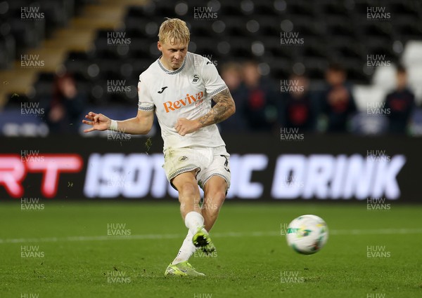 260825 - Swansea City v Plymouth Argyle - Carabao Cup - Melker Widell of Swansea City scores the winning penalty