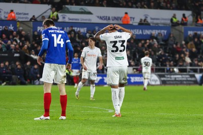 091225 - Swansea City v Portsmouth - Sky Bet Championship - Adam Idah of Swansea City reacts after his shot misses