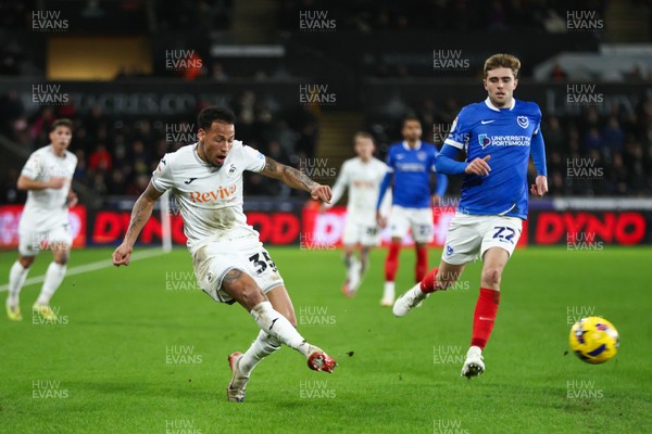 091225 - Swansea City v Portsmouth - Sky Bet Championship - Ronald Pereira Martin of Swansea City crosses the ball