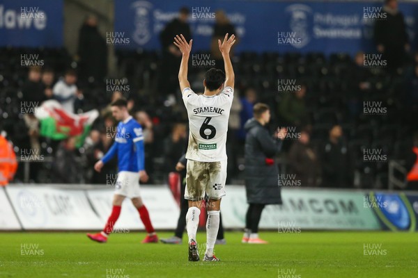 091225 - Swansea City v Portsmouth - Sky Bet Championship - Marko Stamenic of Swansea City waves to fans at full time