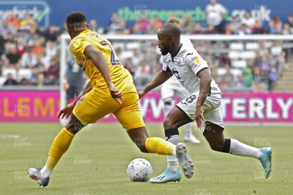 170819 - Swansea City v Preston North End, Sky Bet Championship - Aldo Kalulu of Swansea City (right) in action with Darnell Fisher of Preston North End