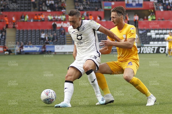 170819 - Swansea City v Preston North End, Sky Bet Championship - Connor Roberts of Swansea City (left) in action with Ben Davies of Preston North End