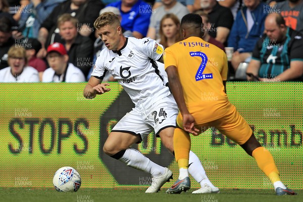 170819 - Swansea City v Preston North End, Sky Bet Championship - Jake Bidwell of Swansea City (left) in action with Darnell Fisher of Preston North End