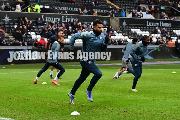 220122 - Swansea City v Preston North End - Sky Bet Championship - Cyrus Christie of Swansea City during the pre-match warm-up 