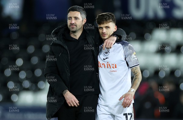 221223 - Swansea City v Preston North End - SkyBet Championship - Swansea City Care Taker Manager Alan Sheehan and Jamie Paterson of Swansea City at full time