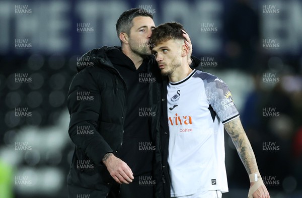 221223 - Swansea City v Preston North End - SkyBet Championship - Swansea City Care Taker Manager Alan Sheehan and Jamie Paterson of Swansea City at full time