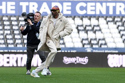 240226 - Swansea City v Preston North End - Sky Bet Championship - Picture shows Swansea City Majority Shareholder Snoop Dogg on his visit to the SwanseaCom Stadium being taken on a tour of the pitch