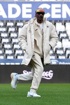 240226 - Swansea City v Preston North End - Sky Bet Championship - Picture shows Swansea City Majority Shareholder Snoop Dogg on his visit to the SwanseaCom Stadium being taken on a tour of the pitch