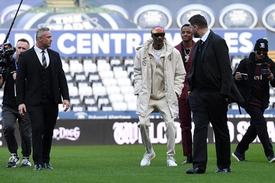 240226 - Swansea City v Preston North End - Sky Bet Championship - Picture shows Lee Trundle (Left) and Swansea City Majority Shareholder Snoop Dogg on his visit to the SwanseaCom Stadium being taken on a tour of the pitch