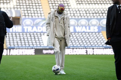 240226 - Swansea City v Preston North End - Sky Bet Championship - Picture shows Swansea City Majority Shareholder Snoop Dogg on his visit to the SwanseaCom Stadium being taken on a tour of the pitch