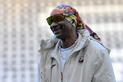 240226 - Swansea City v Preston North End - Sky Bet Championship - Picture shows Swansea City Majority Shareholder Snoop Dogg on his visit to the SwanseaCom Stadium being taken on a tour of the pitch